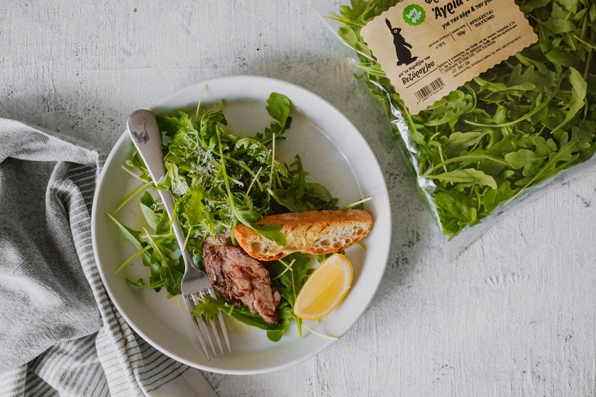 Steak salad with wild rocket leaves, parmesan and croutons from village bread