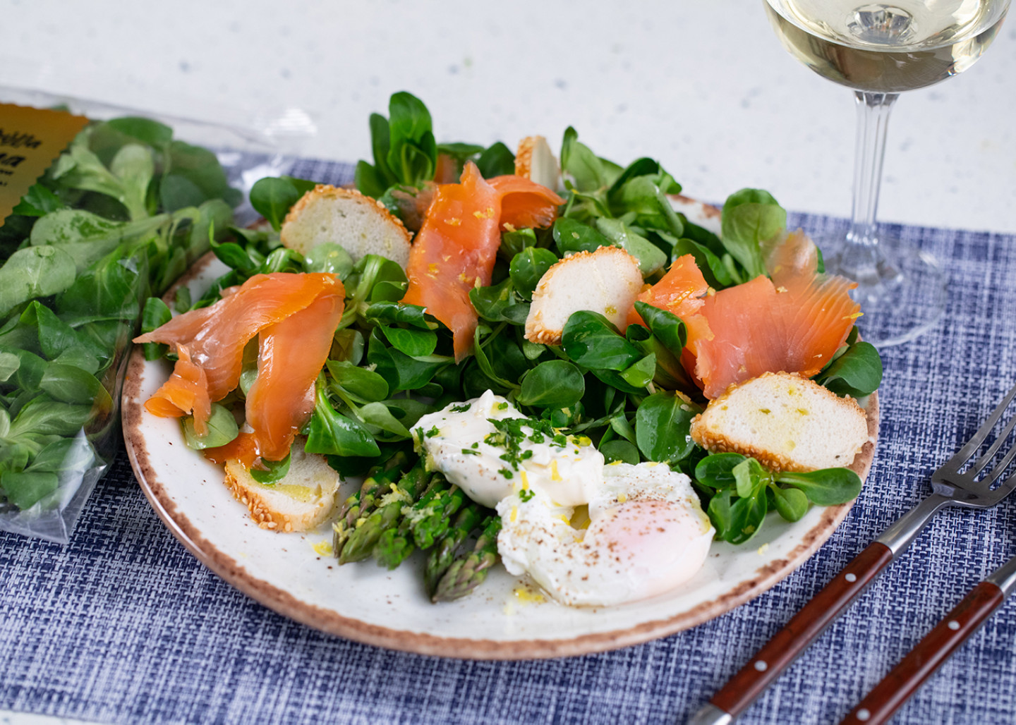 Salad with kale, parmesan and croutons made of Thessaloniki Koulouri